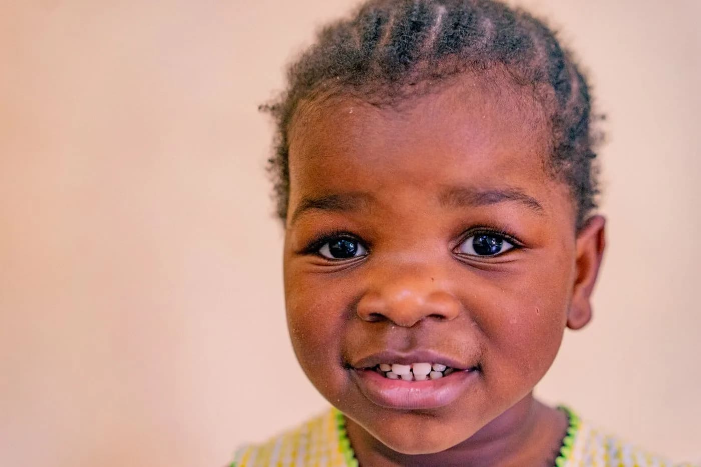 A smiling young child